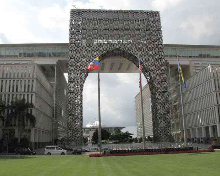 Perbadanan government complex silver archway with Silver Mosque in the background