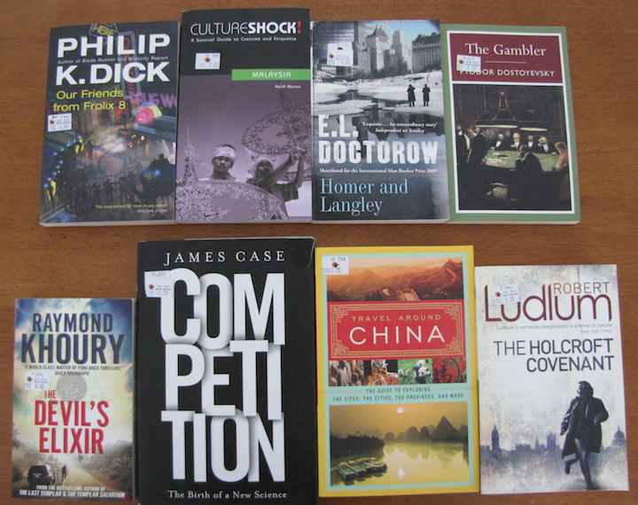 photo of 8 book covers from my Big Bag Wolf haul.