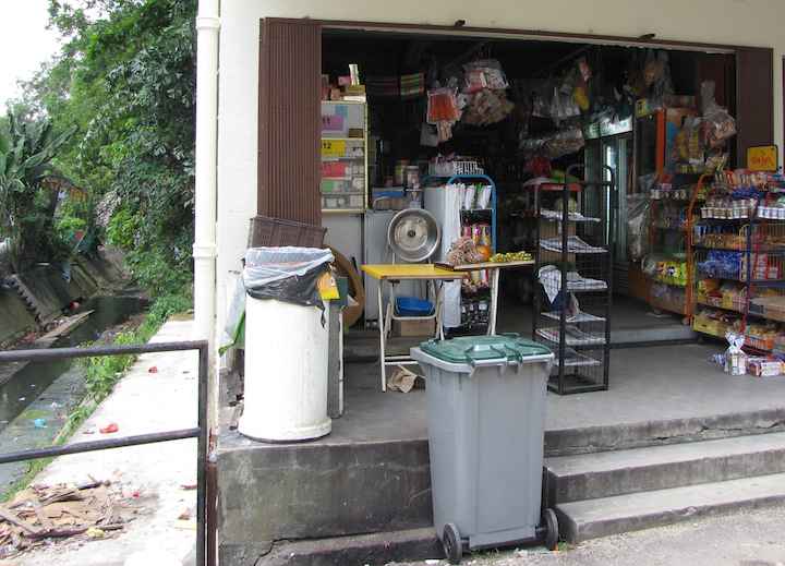 photo of a small neighborhood grocery store in JB