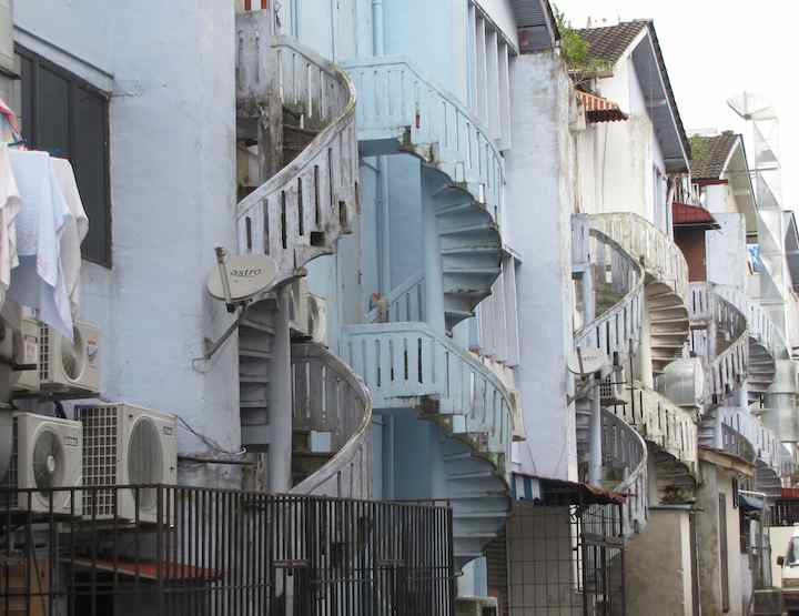photo of spiral stairways in alley