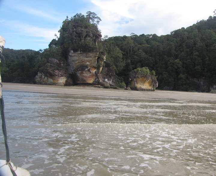 photo looking back at Bako National Park from the boat as I leave