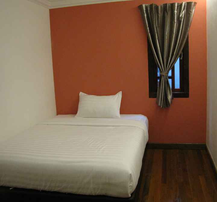 photo of bed Classic Inn Premium