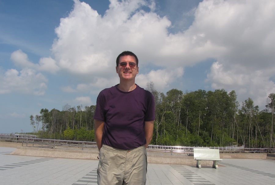 John Hunter with mangrove forest in the background